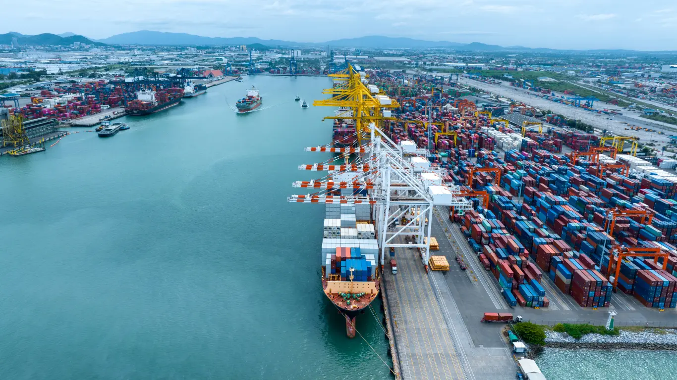 Marine engineer performing 24/7 offshore turbocharger repair and maintenance for vessel engines at a global port hub
